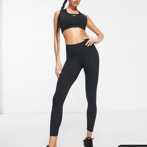 Nike woman’s black leggings size Large.